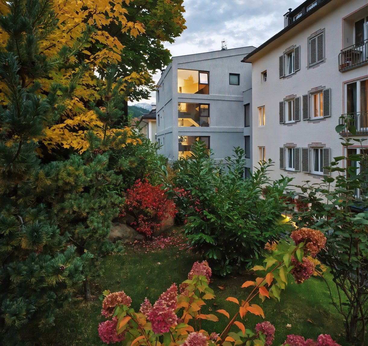 Aquila Dolomites Residence: Ortisei Below, the Dolomites Beyond, and You in Between 21 The lush vegetation withfall colors surrounding Aquila Dolomites.