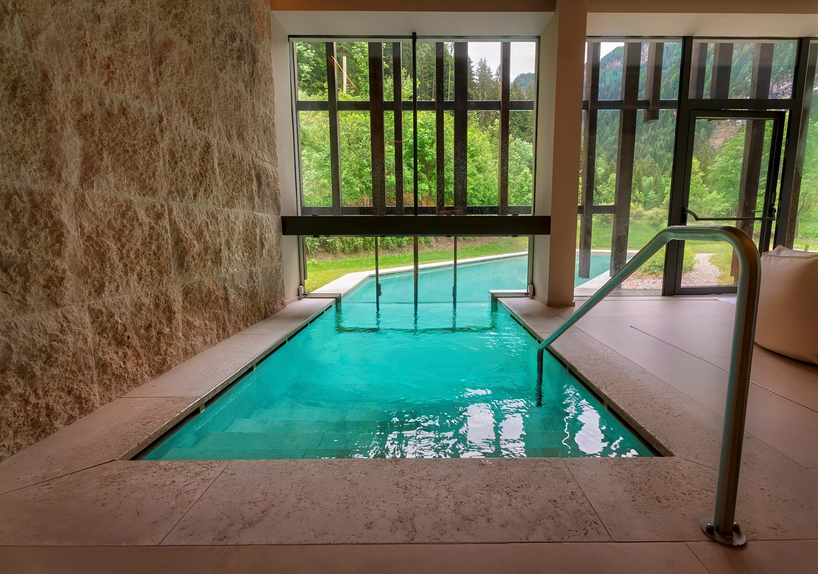 Discover Bad Ratzes: A Forested Escape Beneath South Tyrol's Most Legendary Peak 21 bad ratzes indoor outdoor pool view