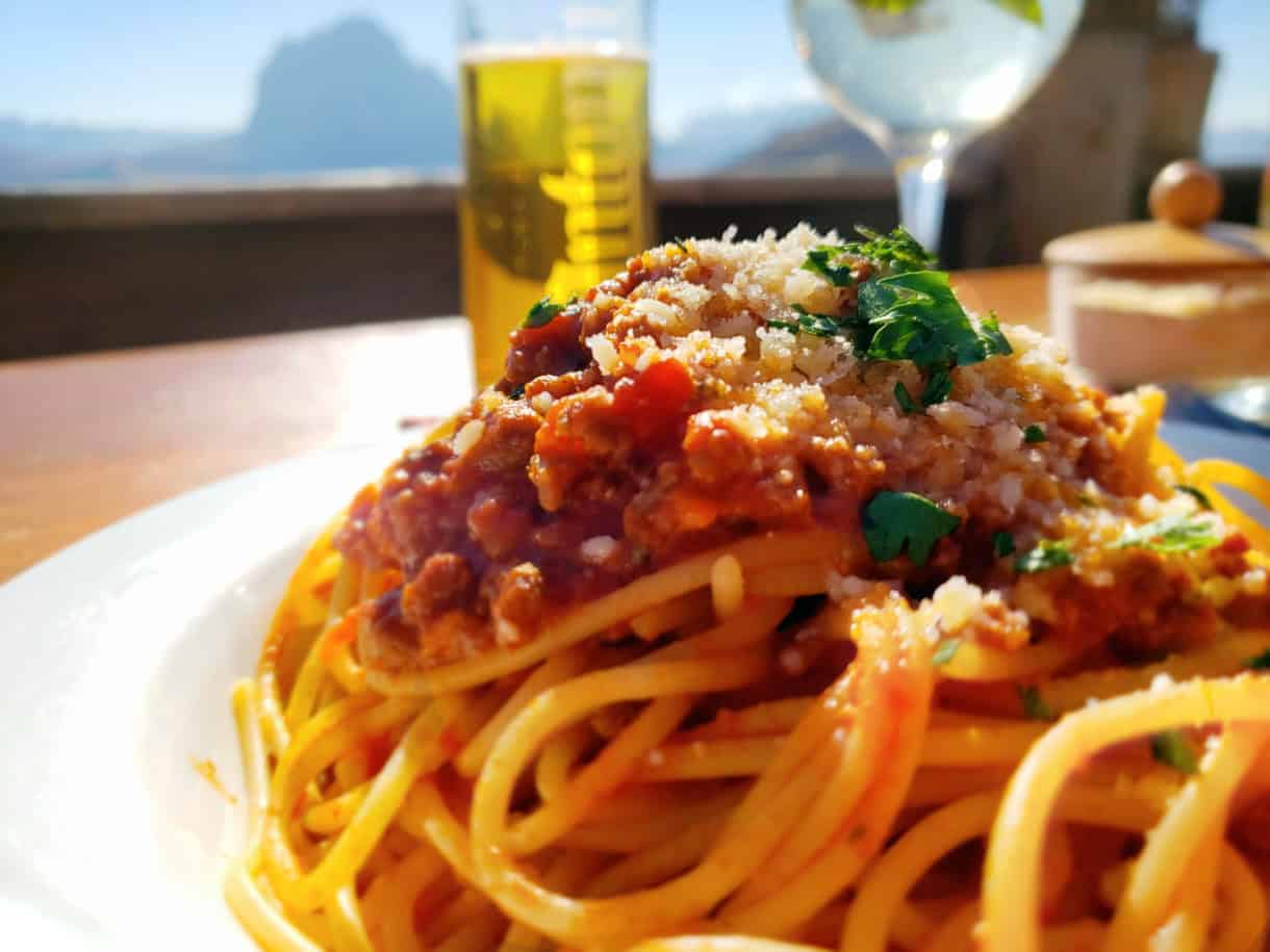 Hiking Seceda: Your 2026 Guide to the Dolomites' Most Iconic Peaks 20 baita troier hutte pasta dish