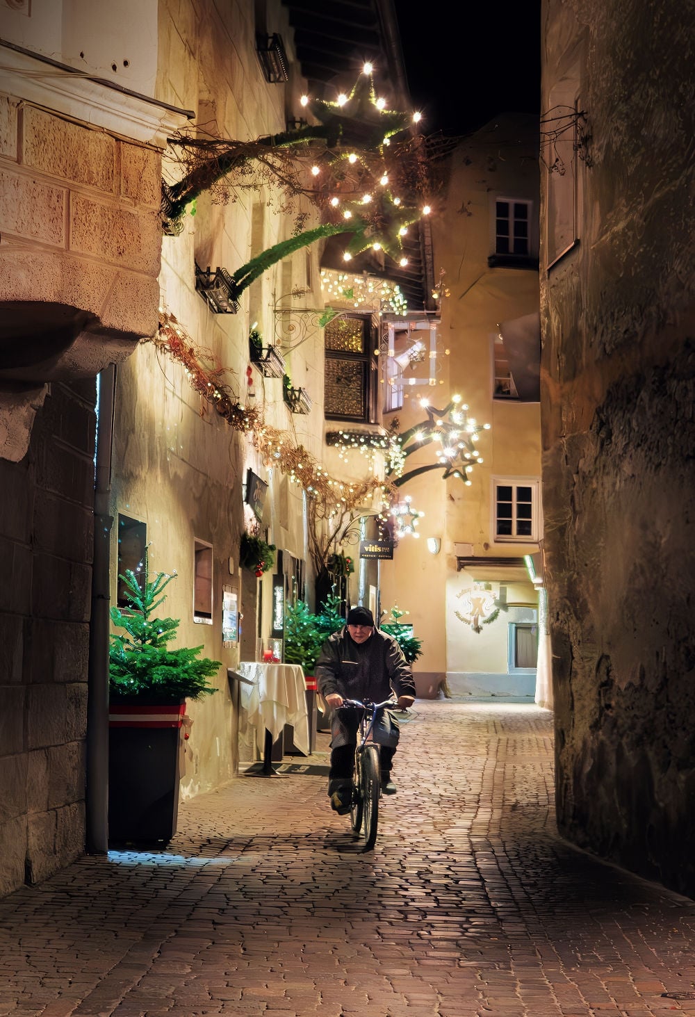 brixen street christmas lights bike rider