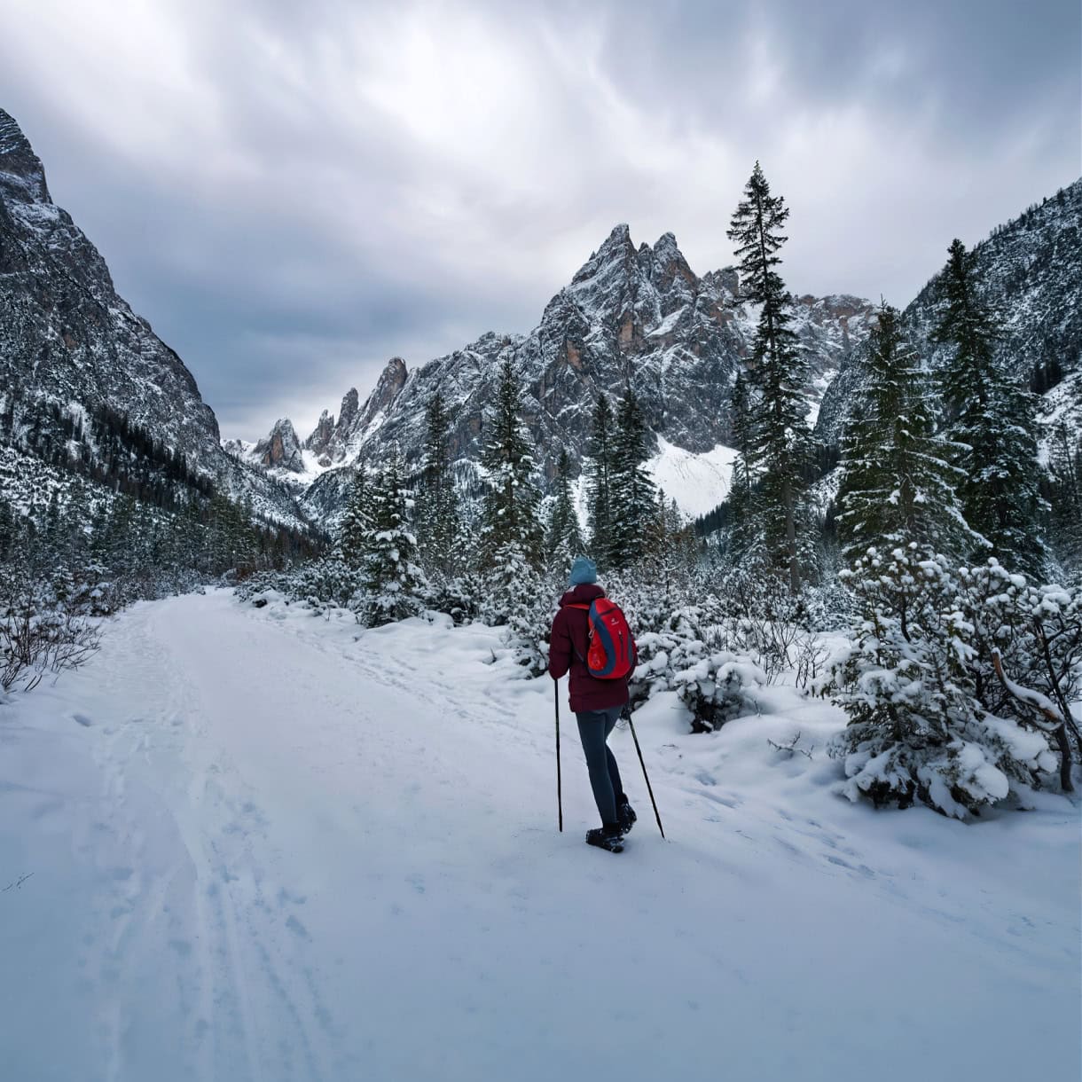 A girl winter hiking in Val Fiscalina.