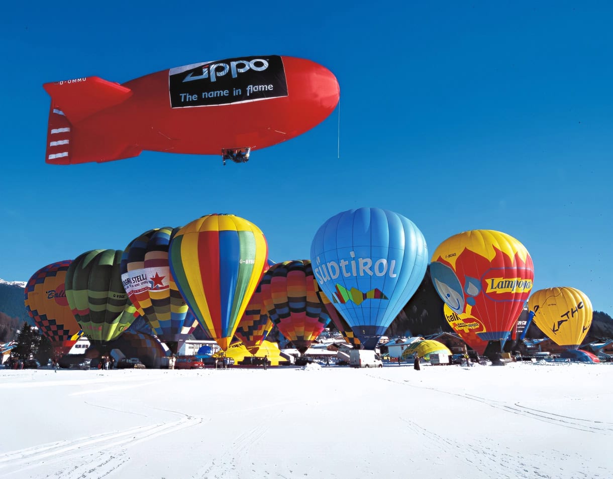 Hot air balloons getting ready for lift off during the Dolomiti Balloon Festival,