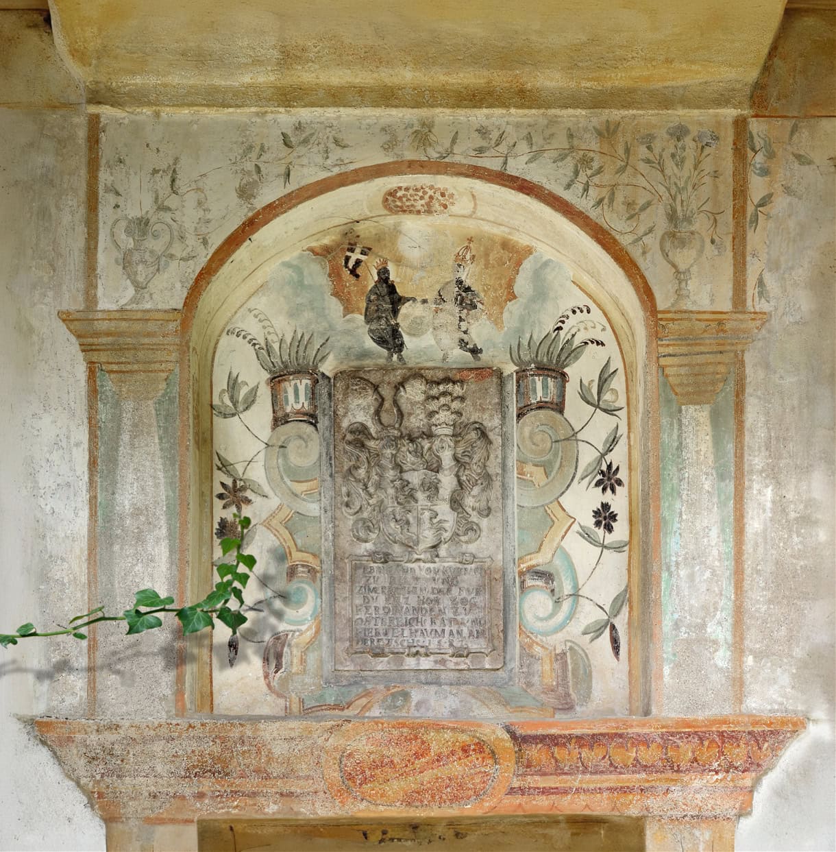 The fresco above the chapel entrance at Edelansitz Zimmerlehen.