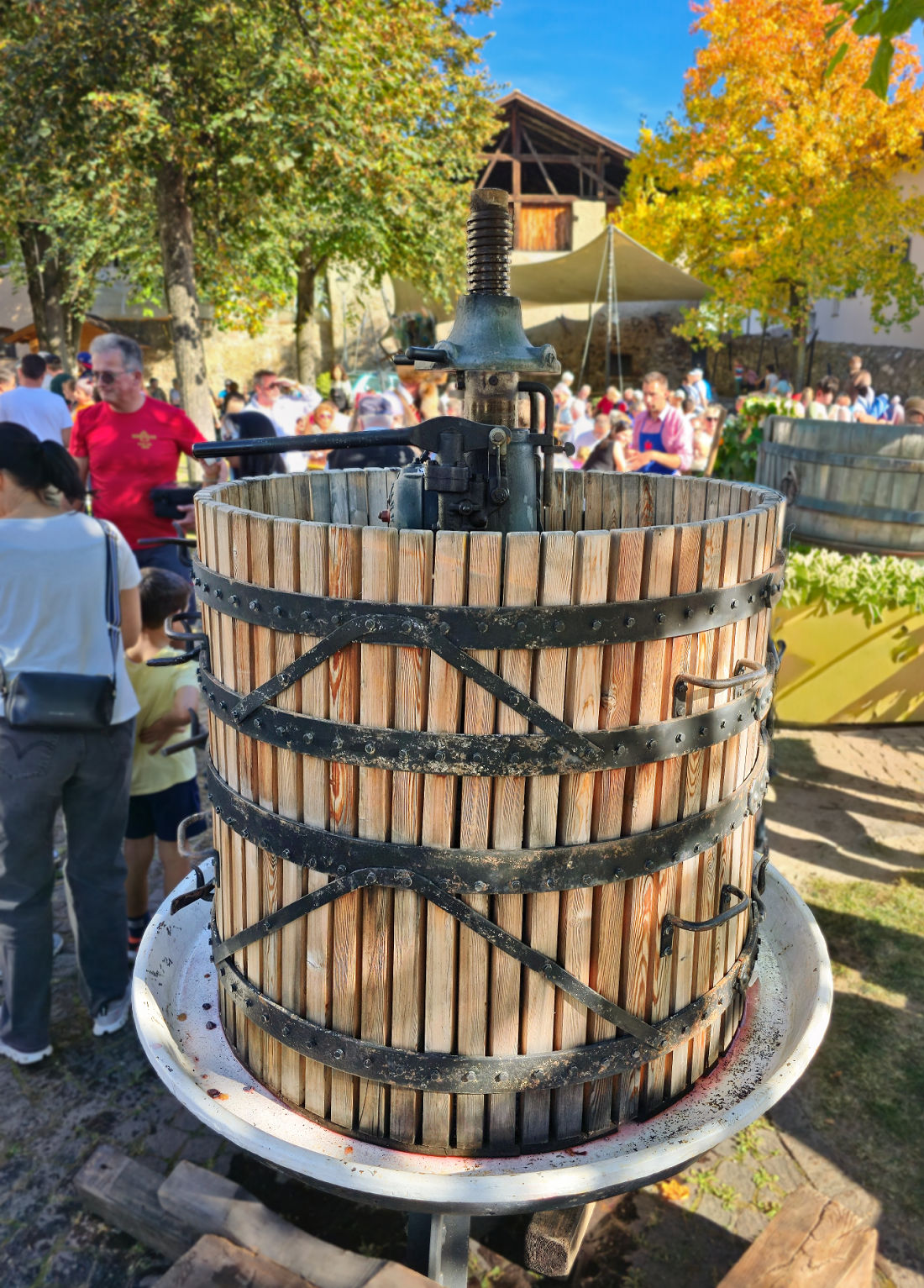 From Vine to Village: Raise a Glass at South Tyrol's Last Load of Grapes Festival 9 girlan last grape load festival grape press