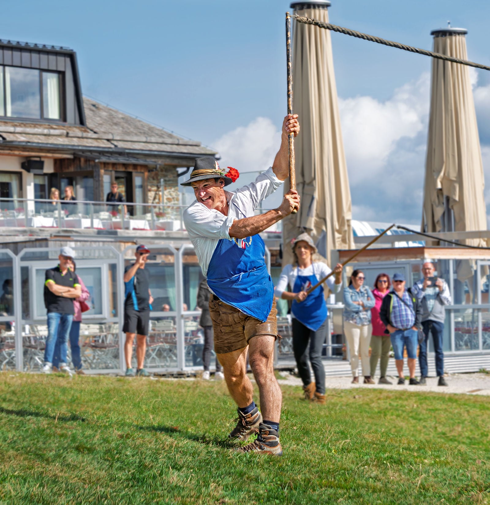 A Goaslschnöller winding up to crack his whip with force in South Tyrol. 