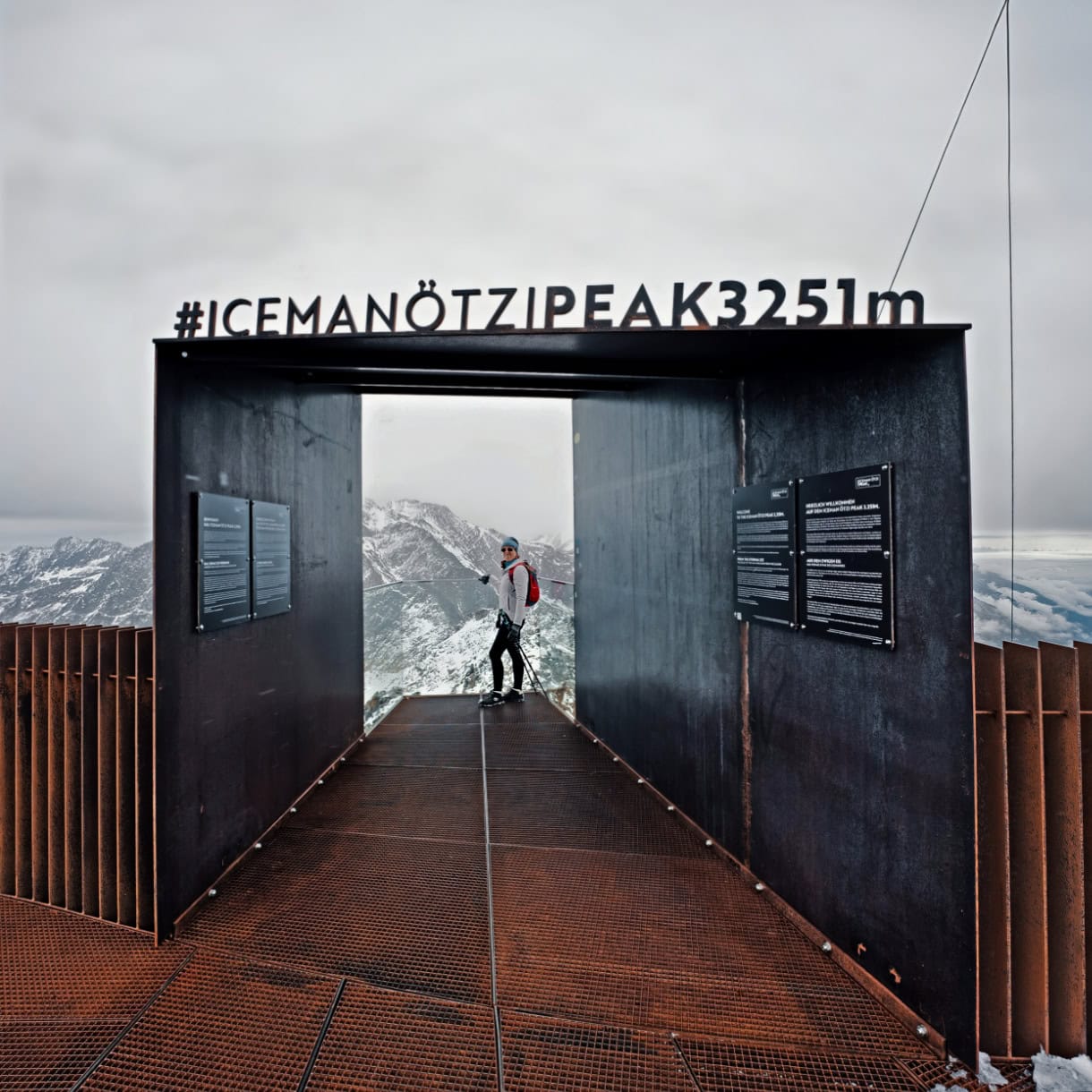 Kate standing at Iceman Ötzi Peak platform on a cold winter morning. 