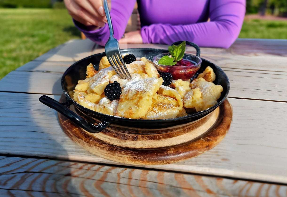 Sweet Summit: 8 Must-Try Desserts in South Tyrol & the Dolomites 4 A skillet of Kaiserschmarrn from a hut on Alpe di Siusi in the Dolomites of South Tyrol.