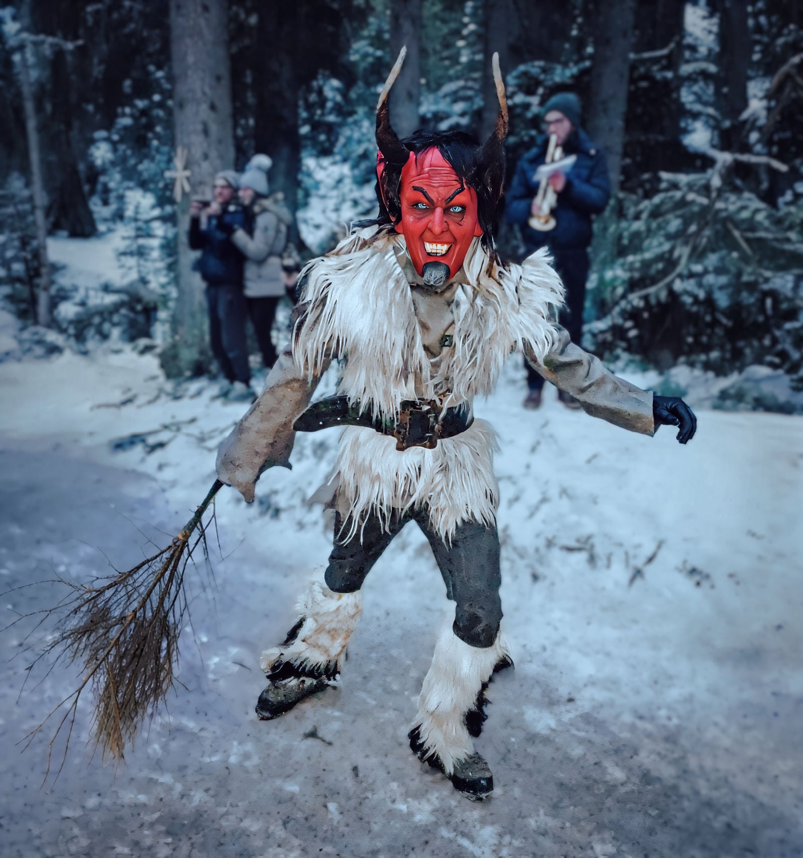 A red-faced Krampus with birch switch bundle. 
