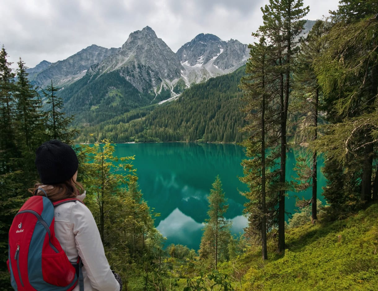 Beyond the Peaks: 12 Must-See Lakes in South Tyrol and the Dolomites 18 lago di anterselva hiker south tyrol