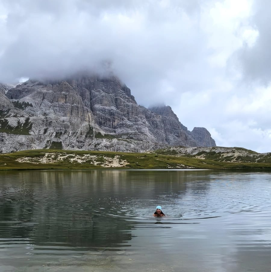 Beyond the Peaks: 12 Must-See Lakes in South Tyrol and the Dolomites 20 lisa zraket swimming dolomites lake