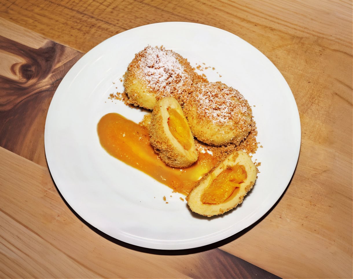 Sweet Summit: 8 Must-Try Desserts in South Tyrol & the Dolomites 6 A plate of Marillenknödel in South Tyrol.