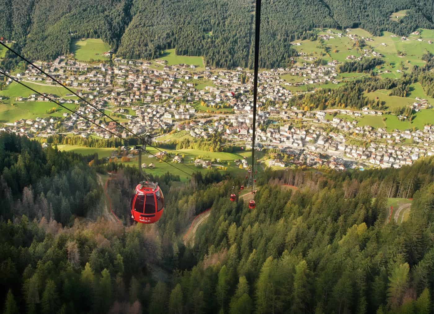 The Mont Seuc Cable Car carrying hikers to Alpe di Siusi / Seiser Alm.