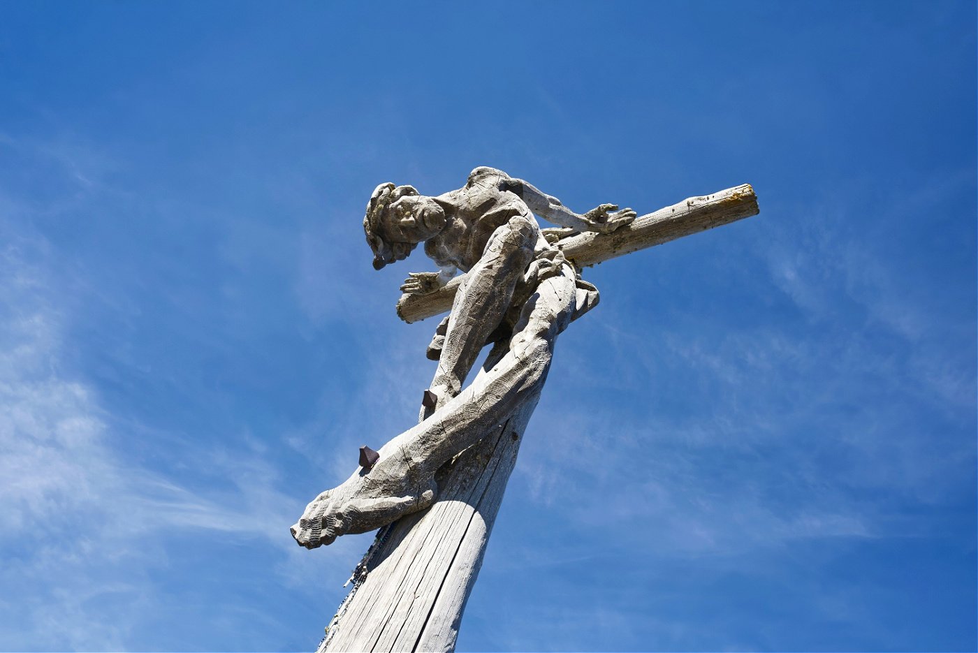 Aquila Dolomites Residence: Ortisei Below, the Dolomites Beyond, and You in Between 17 The summit cross on the Resciesa Alp.