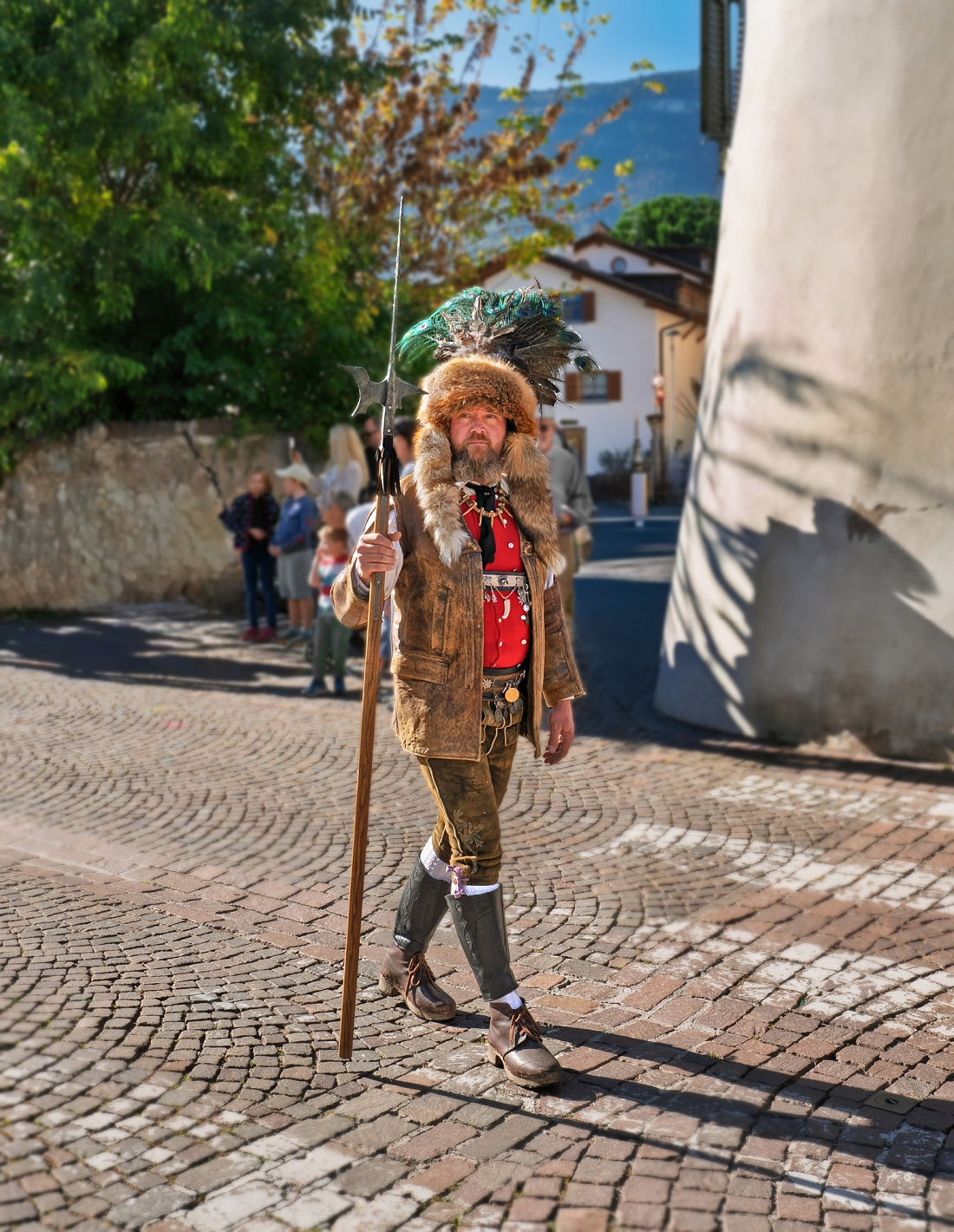 From Vine to Village: Raise a Glass at South Tyrol's Last Load of Grapes Festival 5 A Saltner leading the arrival of the grapes at the Last Load of Grapes Festival in Girlan, South Tyrol.