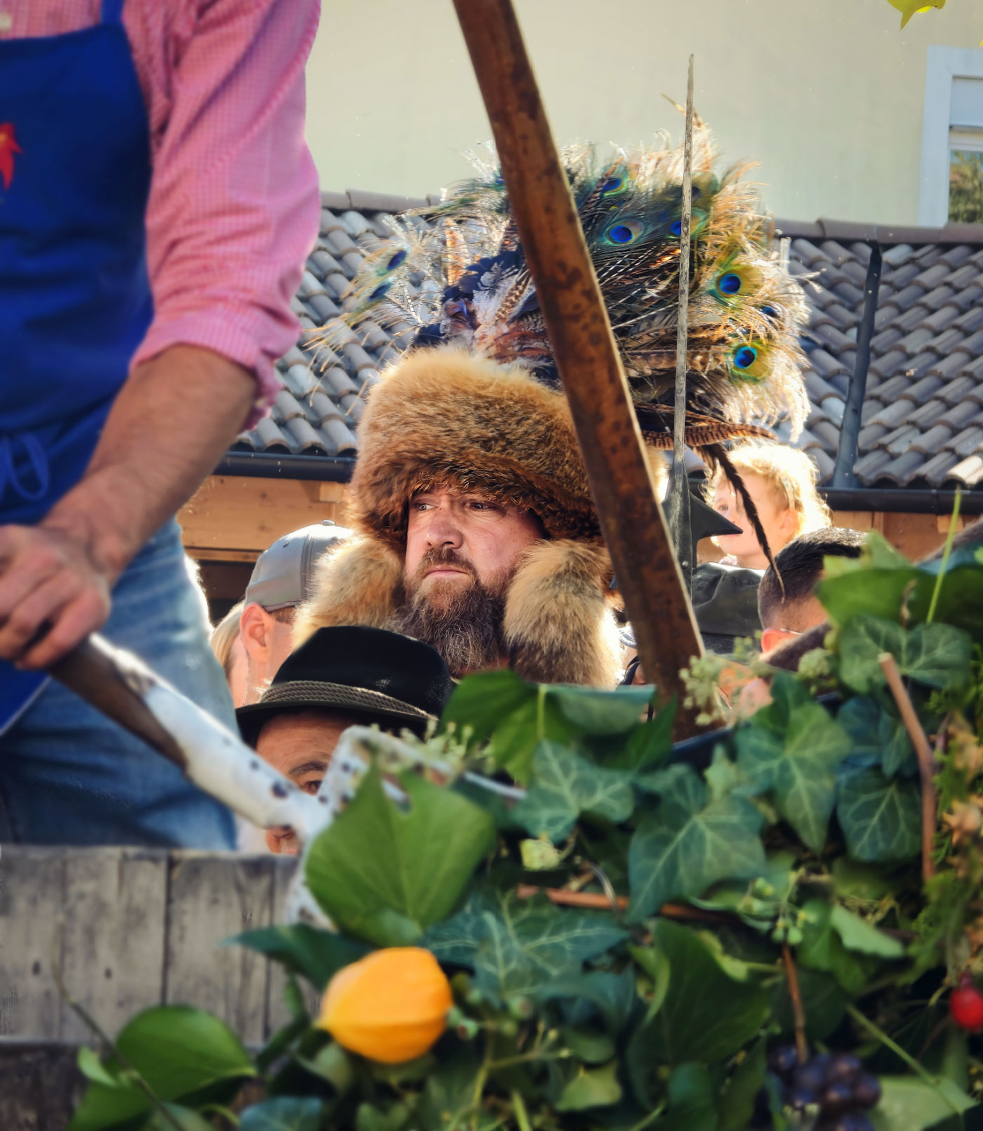 From Vine to Village: Raise a Glass at South Tyrol's Last Load of Grapes Festival 12 A Saltner keeping an eye on festival goers in Girlan.